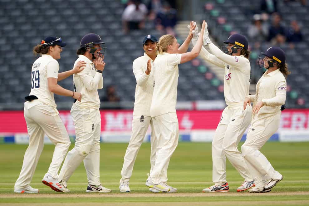 England's players celebrate a wicket