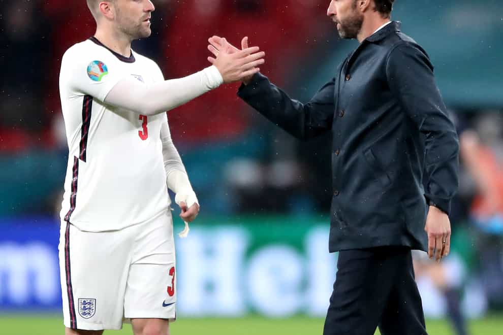 England’s Luke Shaw (left) and England manager Gareth Southgate