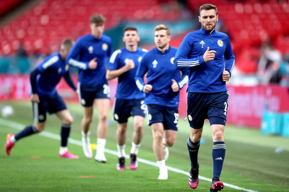 Scotland’s Stephen O’Donnell, right, warms up at Wembley