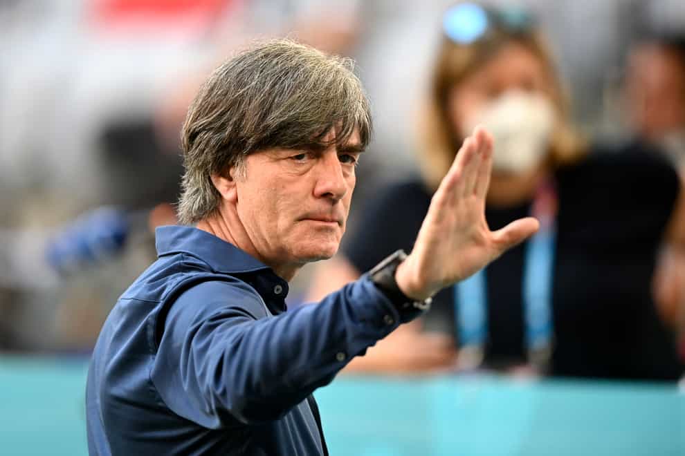 Germany coach Joachim Low gestures towards fans