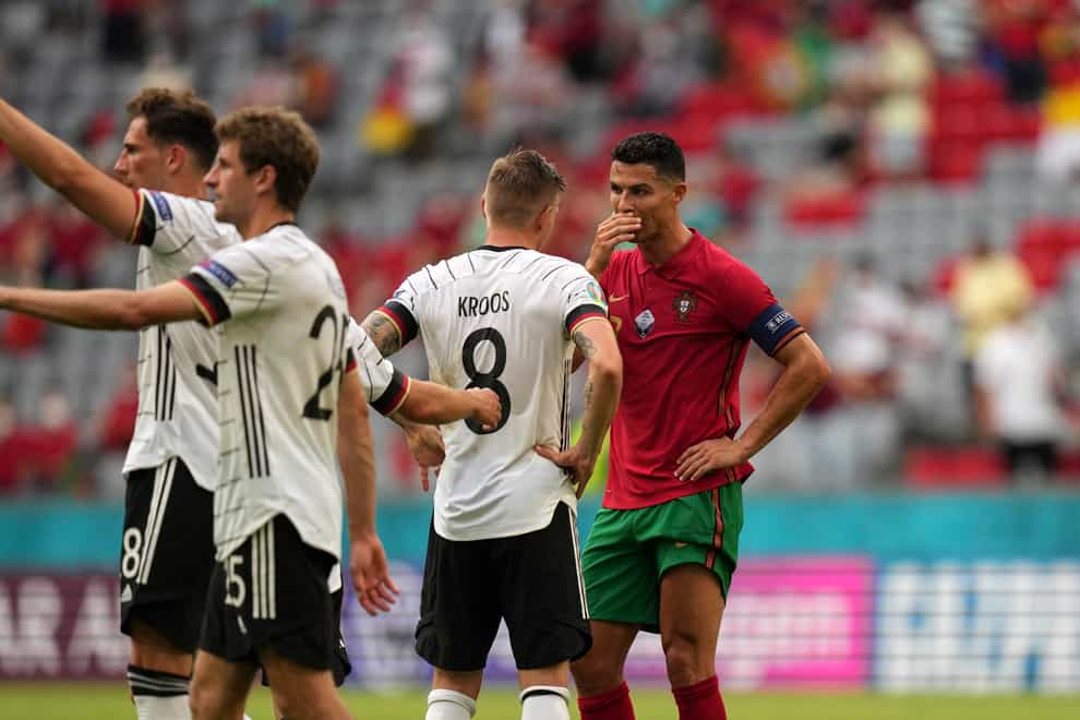 Portugal’s Cristiano Ronaldo (right) talks to Germany’s Toni Kroos after the Euro 2020 match in Munich