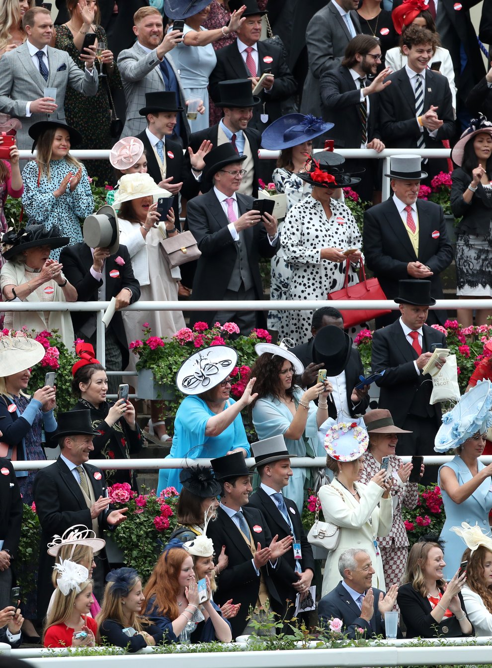 Crowds cheer as the Queen arrives on day five of Royal Ascot
