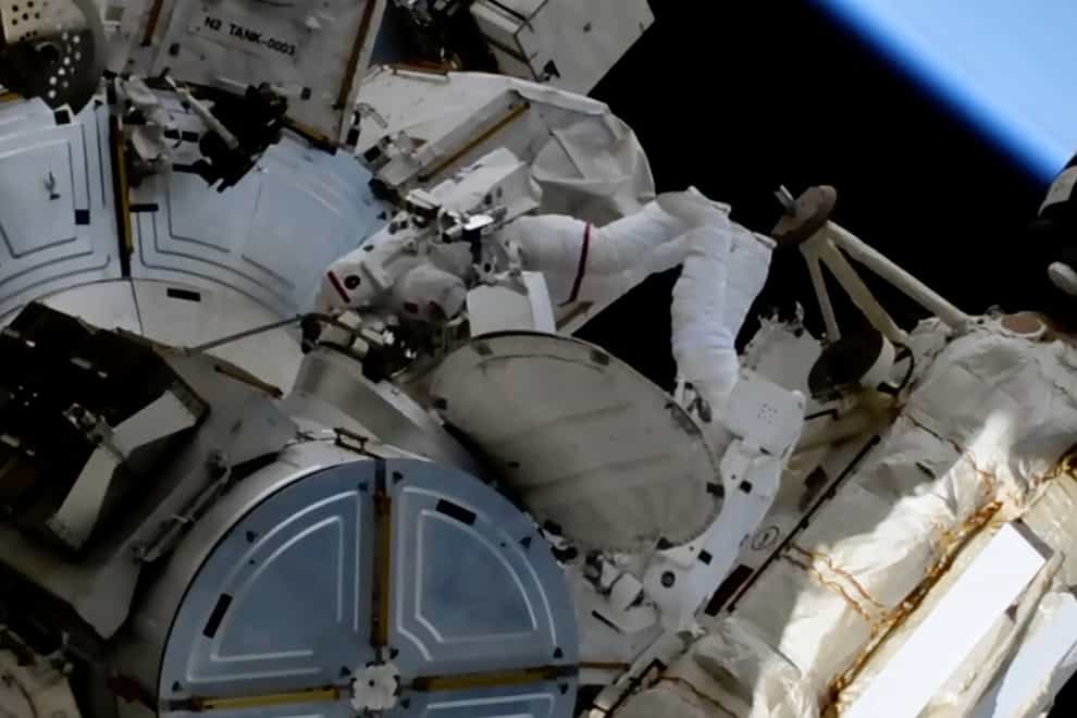 French astronaut Thomas Pesquet and Nasa astronaut Shane Kimbrough during the first spacewalk outside the International Space Station (Nasa via AP)