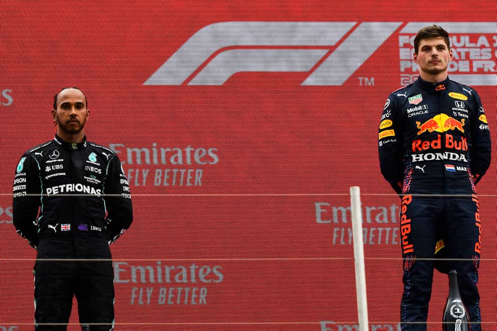 Red Bull driver Max Verstappen, right, and Lewis Hamilton of Mercedes on the podium