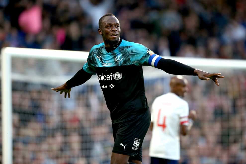 Usain Bolt participating in a football match