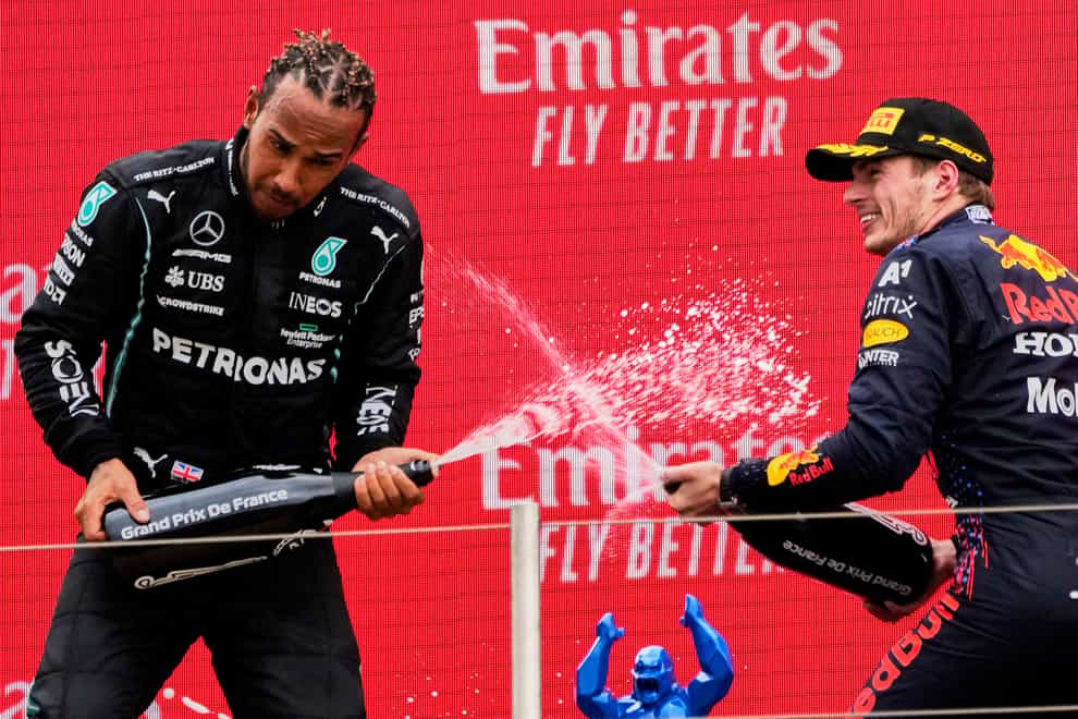 Lewis Hamilton and Max Verstappen spray champagne