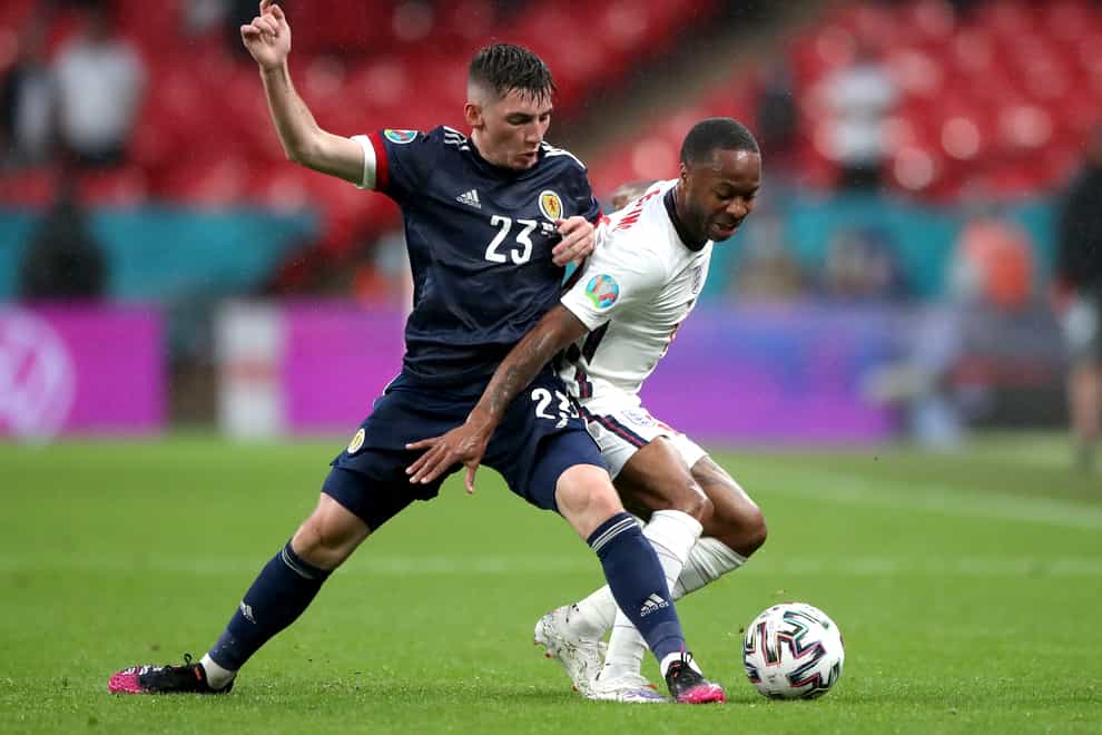 <p>Scotland’s Billy Gilmour battles with England forward Raheem Sterling on Friday</p>