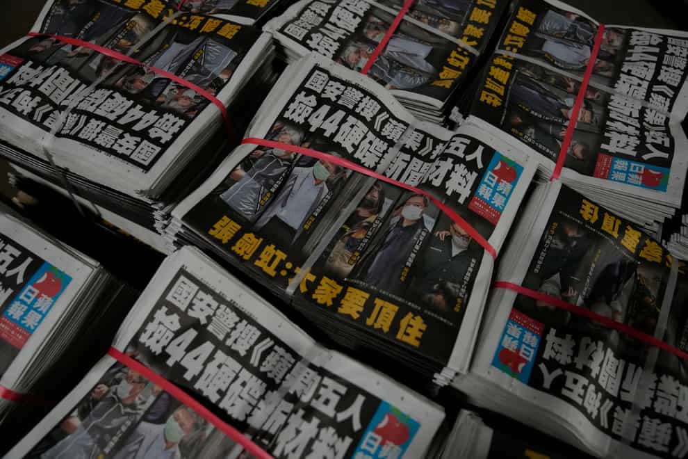 Copies of the Apple Daily newspaper