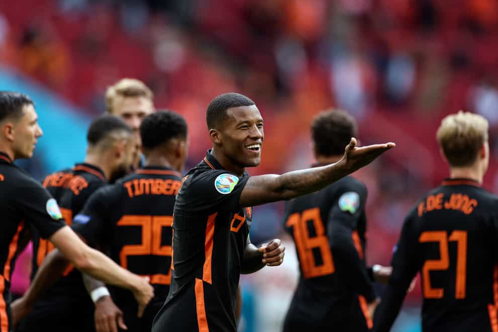 Georginio Wijnaldum celebrates after scoring Holland's second goal against North Macedonia