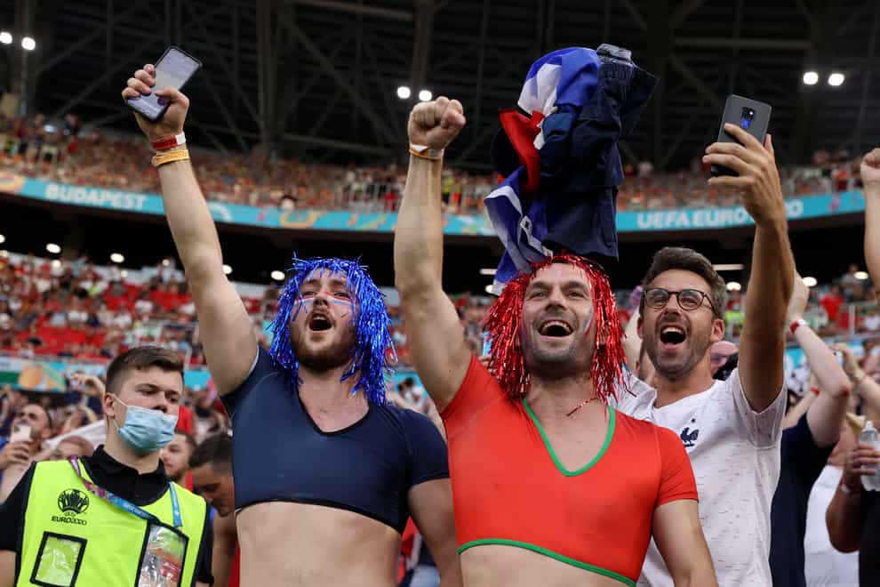 Fans attend the Portugal v France Euros match in Budapest on June 23