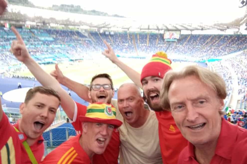 Wales fan Tim Hartley (right) and Nick Williams (second right) with friends at the country's Euro 2020 match with Italy in Rome