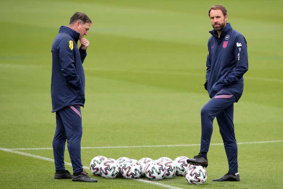 England manager Gareth Southgate (right) and assistant Steve Holland during a training session at St George’s Park