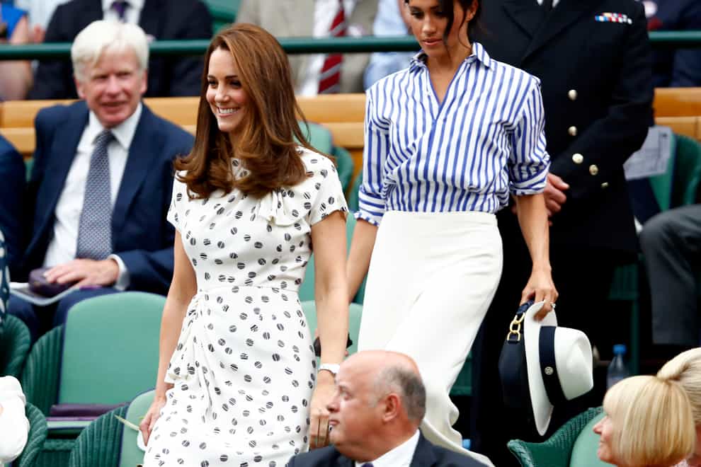 <p>The Duchess of Cambridge and the Duchess of Sussex in the royal box at Wimbledon 2018</p>