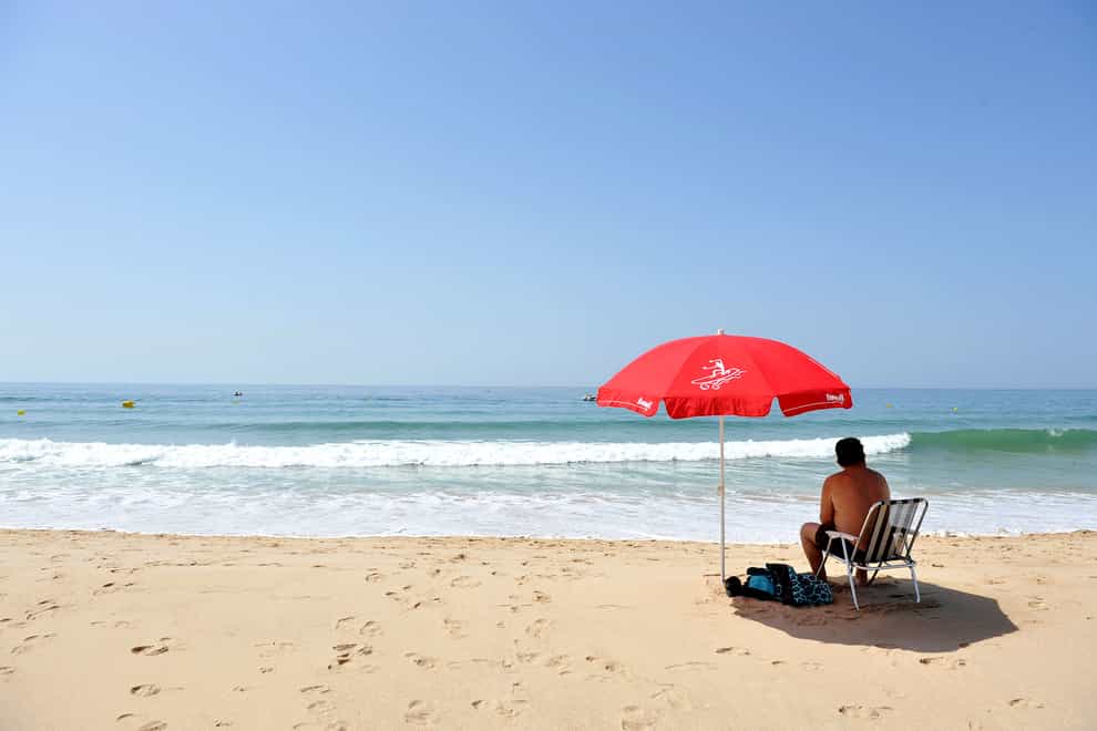 A man on a beach in Portugal