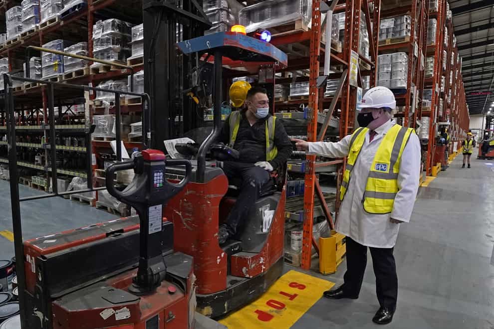 Boris Johnson in a factory