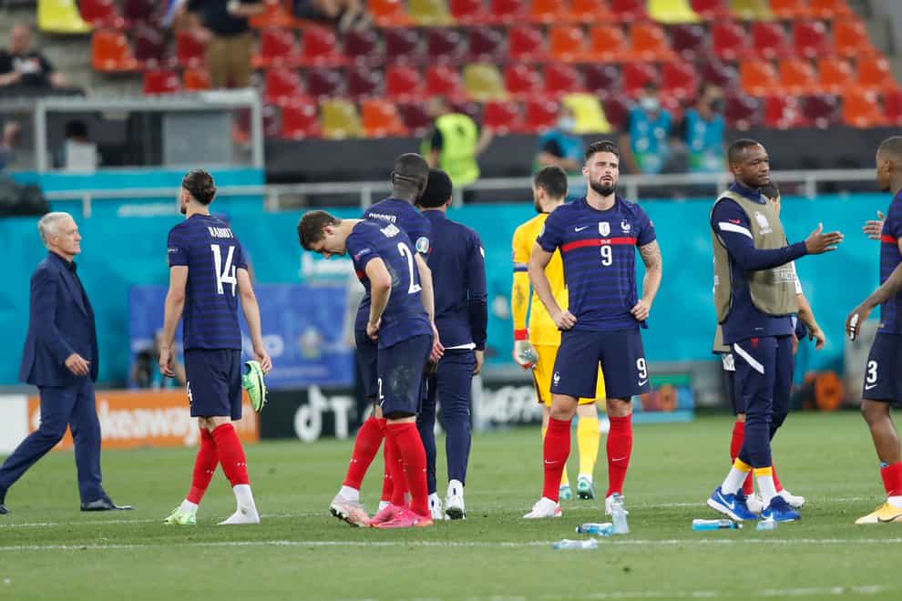 France's players look dejected after being knocked out of Euro 2020