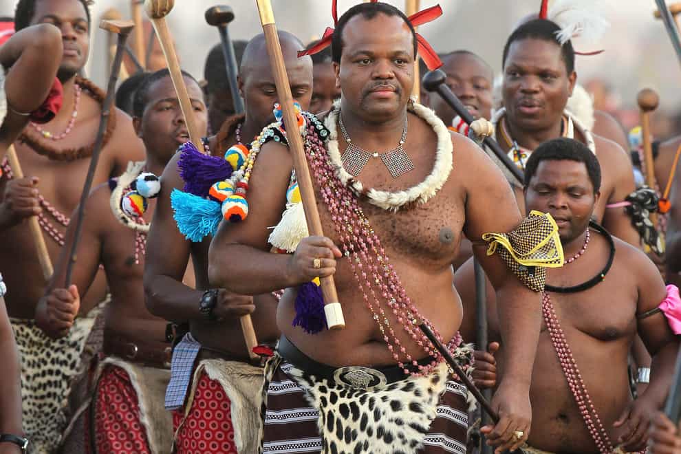 Eswatini’s King, Mswati III, front, dances during a Reed Dance in Mbabane (Themba Hadebe/AP)