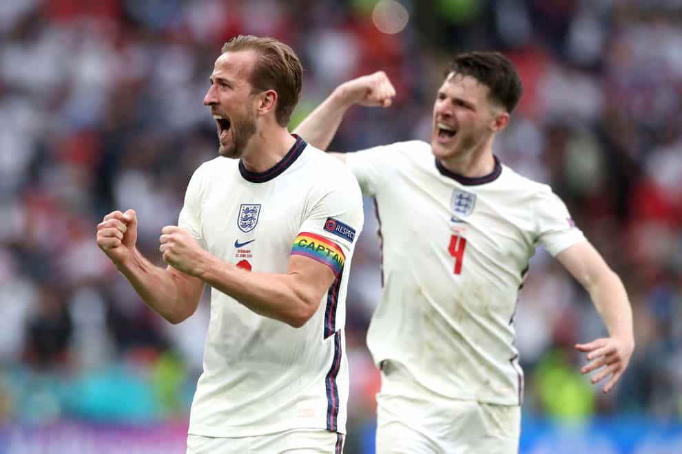England’s Harry Kane, left, and Declan Rice celebrate
