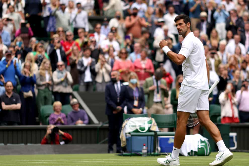 Novak Djokovic made it through to round three with a straight-sets win against Kevin Anderson at Wimbledon