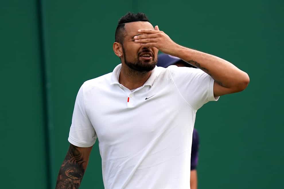 Nick Kyrgios reacts to a point