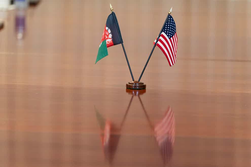The flags of Afghanistan and the United States