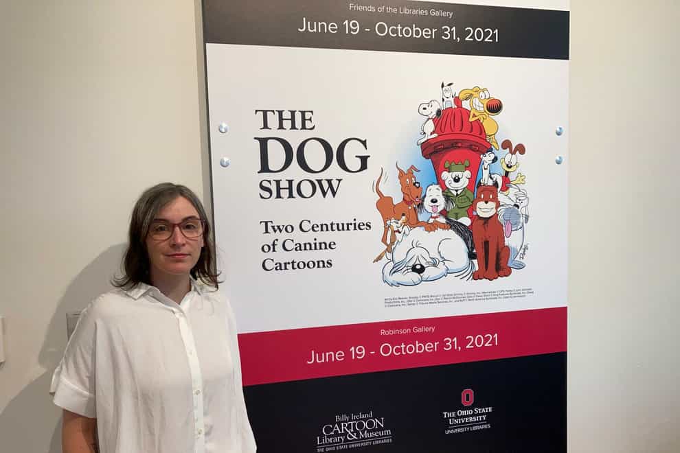 Anne Drozd, museum co-ordinator at Ohio State University’s Billy Ireland Cartoon Library Museum, stands at the entrance to the library’s new exhibit, The Dog Show
