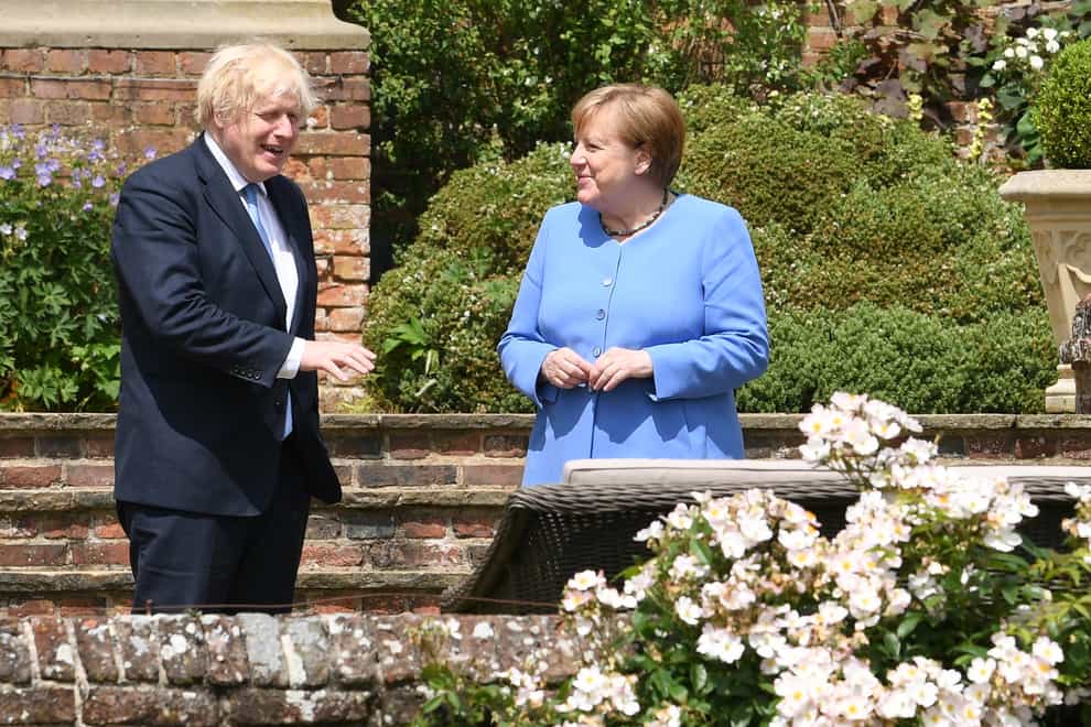 Prime Minister Boris Johnson and the Chancellor of Germany, Angela Merkel (Stefan Rousseau/PA)