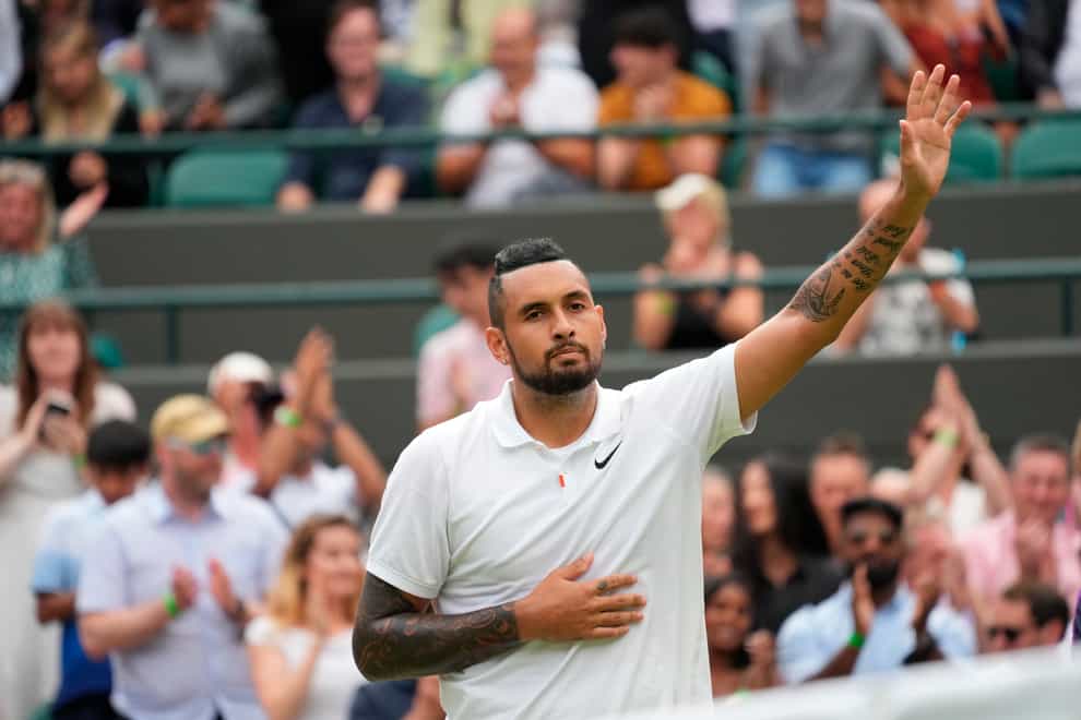 <p>Nick Kyrgios waves to the Wimbledon crowds</p>