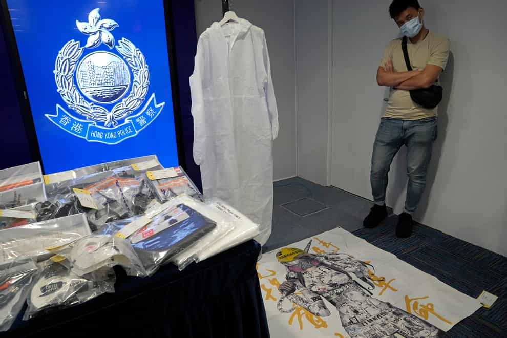 Confiscated evidence are displayed during a news conference as nine people were arrested over the alleged plot to plant bombs around Hong Kong