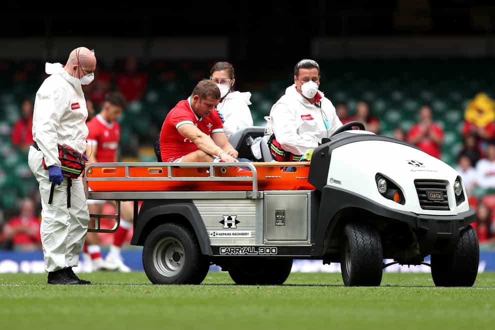Leigh Halfpenny being taken off on a stretcher cart