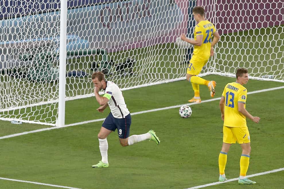 Harry Kane celebrates after scoring against Ukraine