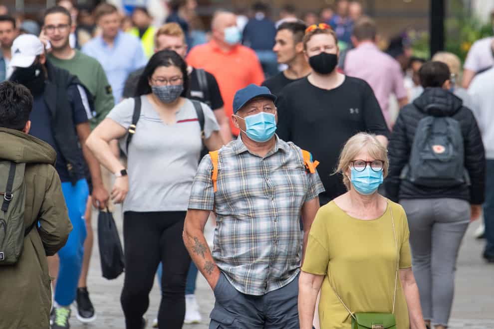 People wearing masks in London's Covent Garden