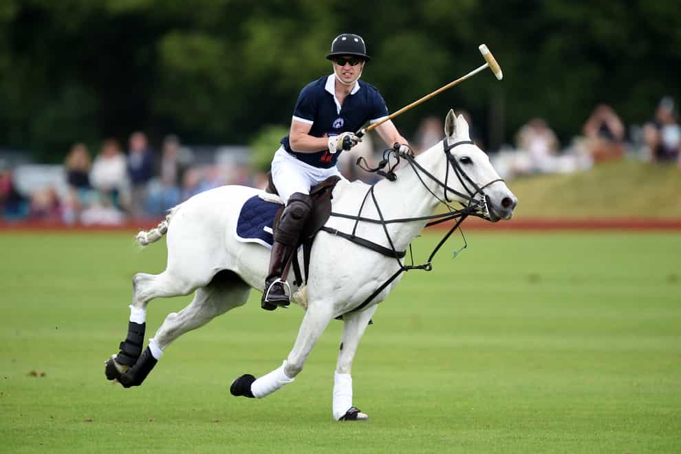 The Duke of Cambridge takes part in a charity polo match at Beaufort Polo Club in 2016