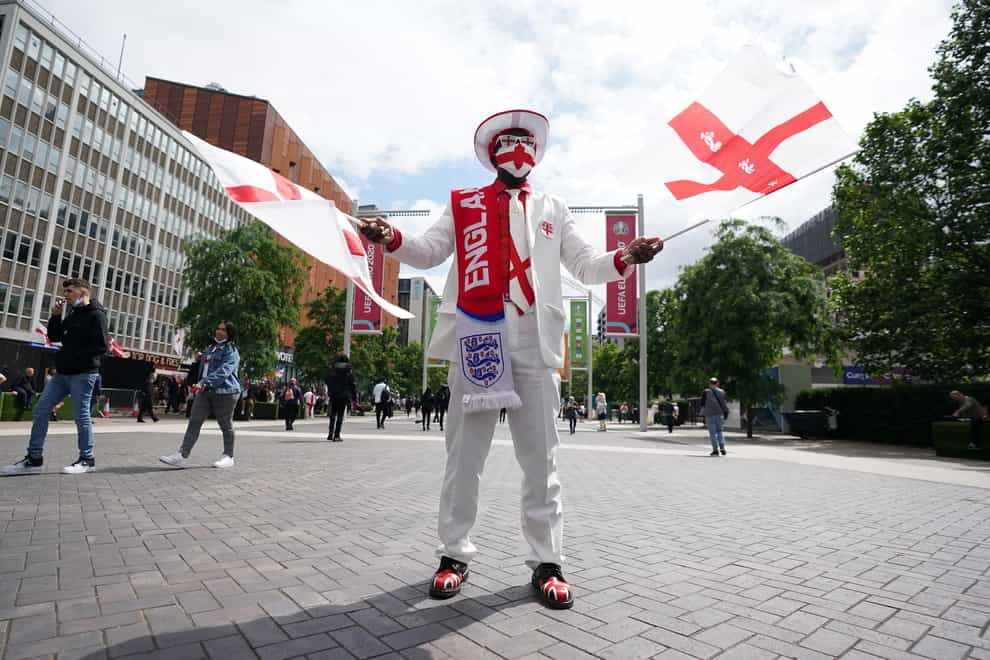 An England fan outside Wembley Stadium ahead of the Euro 2020 semi-final between England and Denmark