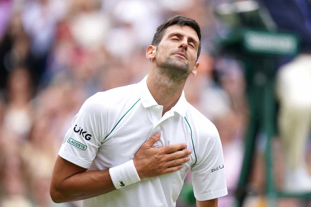 Novak Djokovic reacts after winning