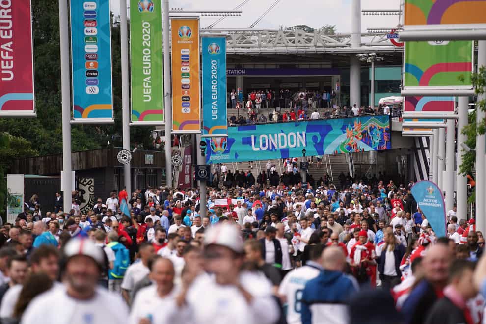 Fans outside Wembley Stadium ahead of the Euro 2020 semi-final match between England and Denmark