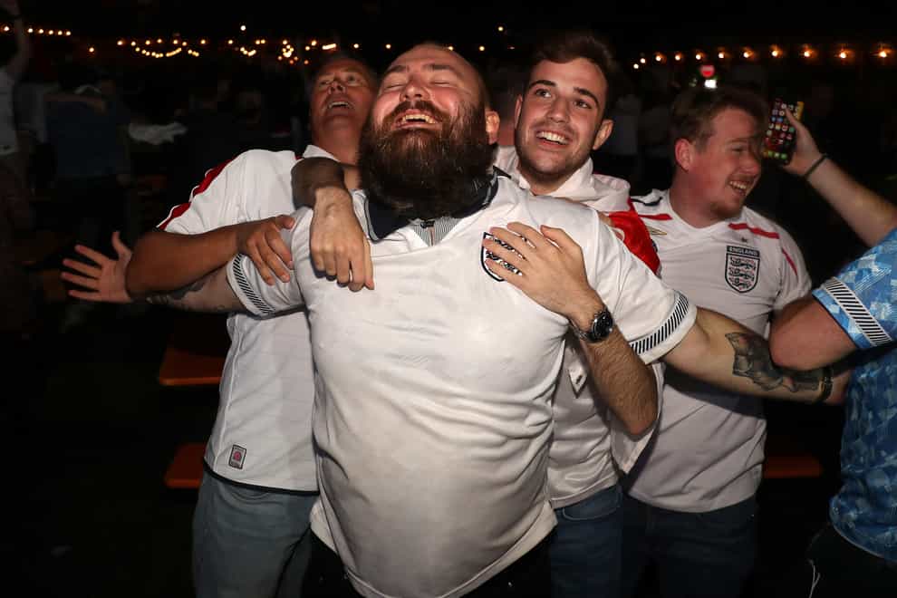 Fans at the Vinegar Yard in London watch the Euro 2020 semi final match between England and Denmark