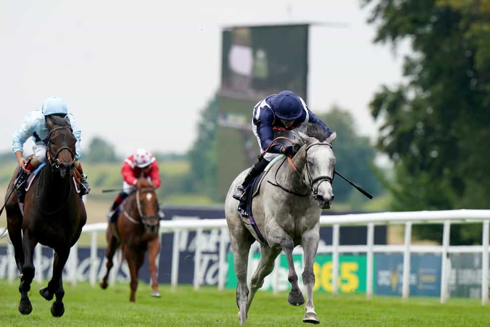 Snow Lantern ridden by Sean Levey (right) on their way to win the Tattersalls Falmouth Stakes