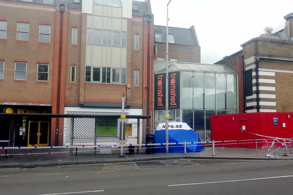 Police cordoned off a block of shops on Woolwich New Road