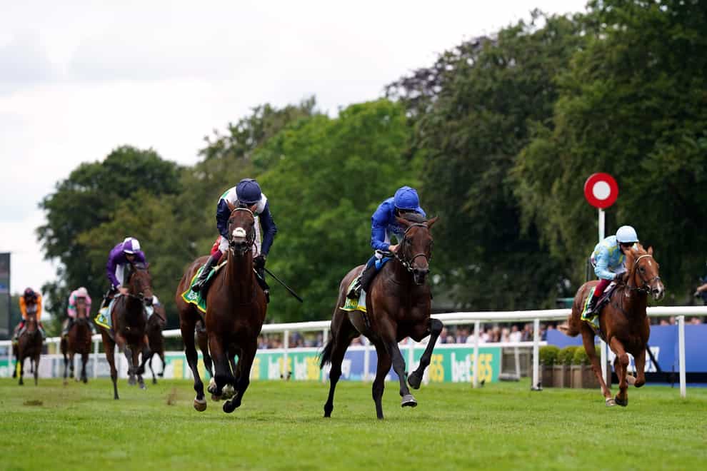 Native Trail and William Buick (centre) won the bet365 Superlative Stakes at Newmarke