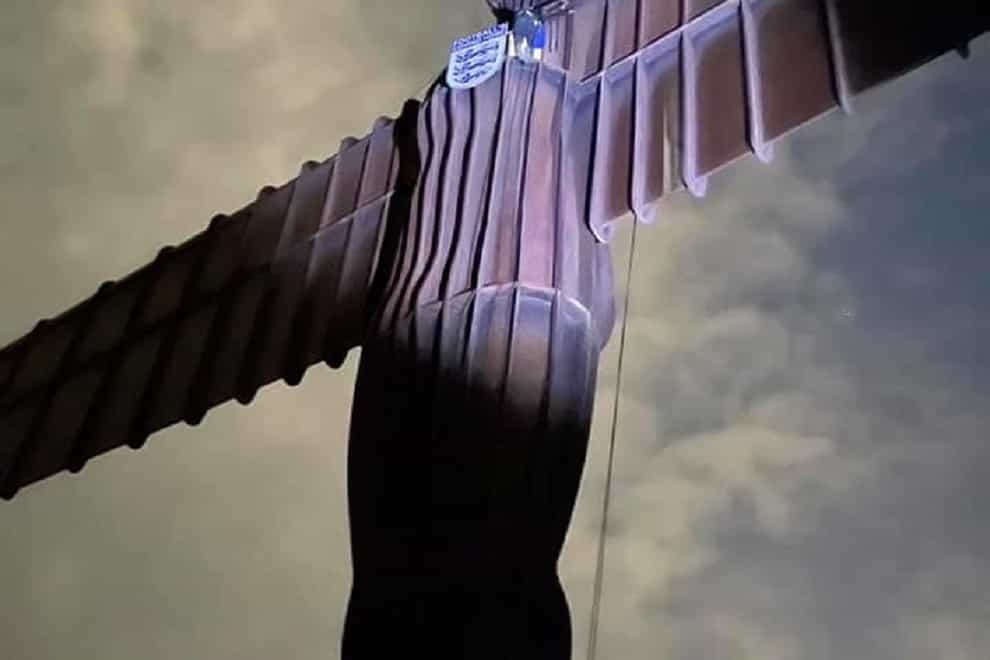 The Angel of the North with an England badge