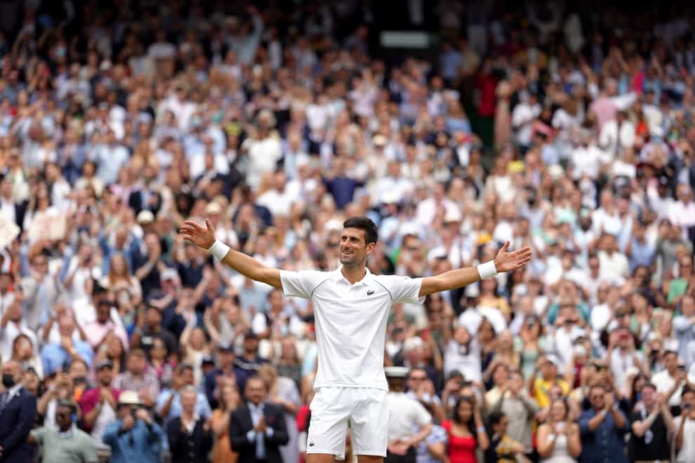 Novak Djokovic celebrates winning his 20th grand slam title
