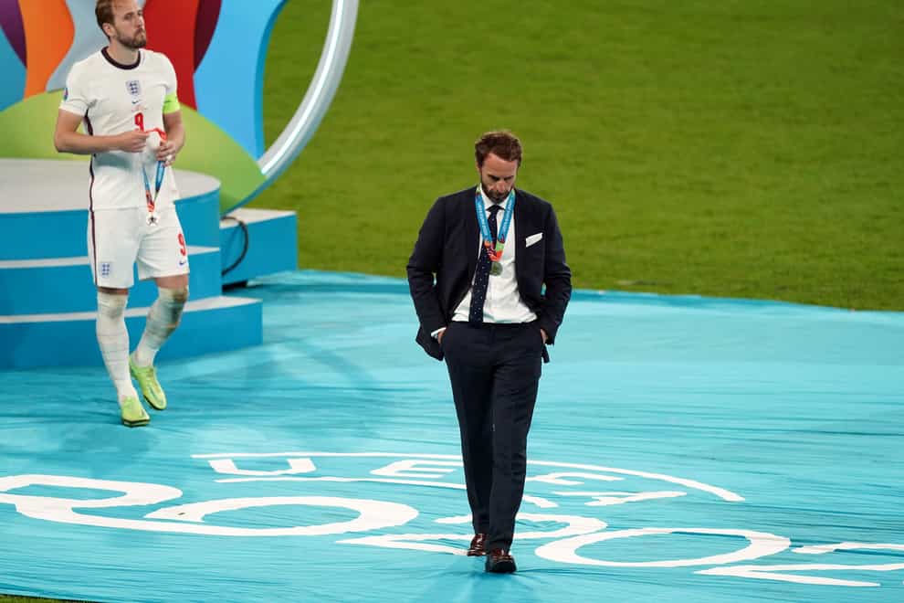England manager Gareth Southgate and Harry Kane (left) are dejected following the UEFA Euro 2020 Final at Wembley Stadium, London