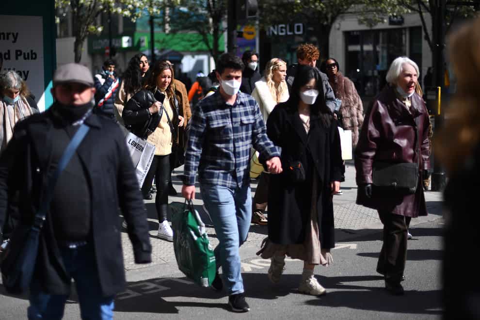 Shoppers wearing masks on Oxford Street in London
