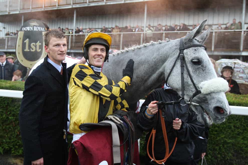 Nick Mitchell (left) with jockey Andrew McNamara and The Listener after winning the JNwine.com Champion Chase at Down Royal in 2009