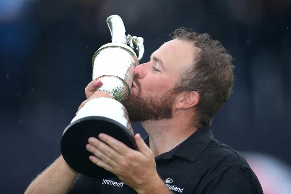 Shane Lowry celebrates with the Claret Jug after winning the 2019 Open