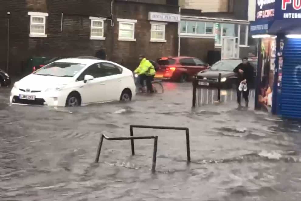 <p>Flooded Turnpike Lane in north London</p>