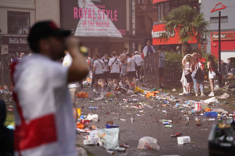 Piles of rubbish left behind by partying England fans in Leicester Square