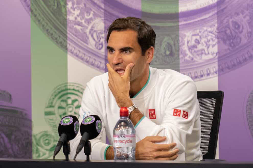 <p>Roger Federer attends a press conference at Wimbledon</p>