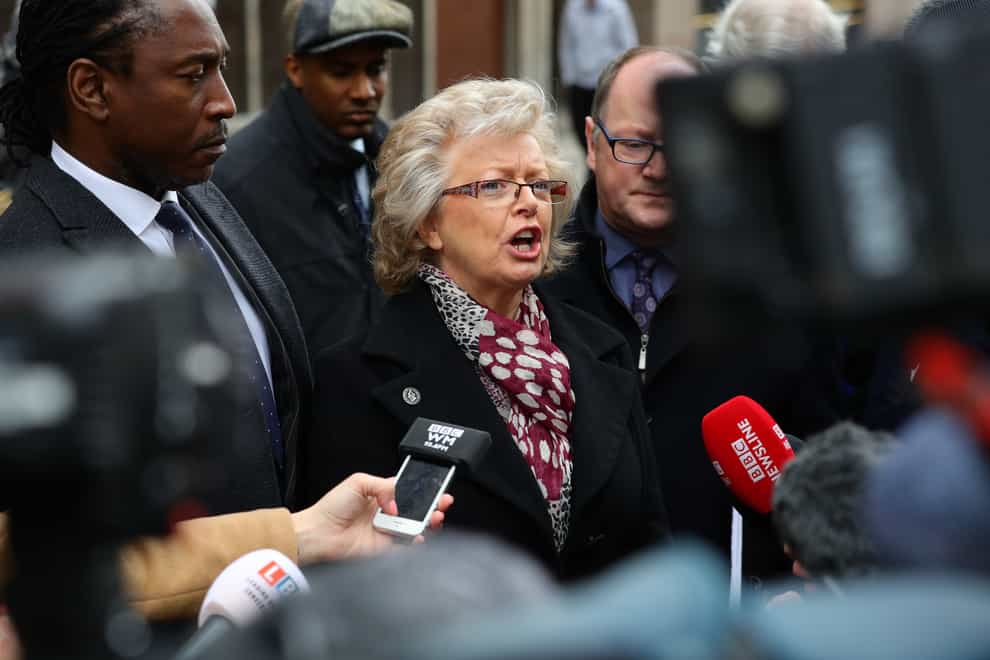 Julie Hambleton (centre) speaks to the media outside the Civil Justice Centre in Birmingham